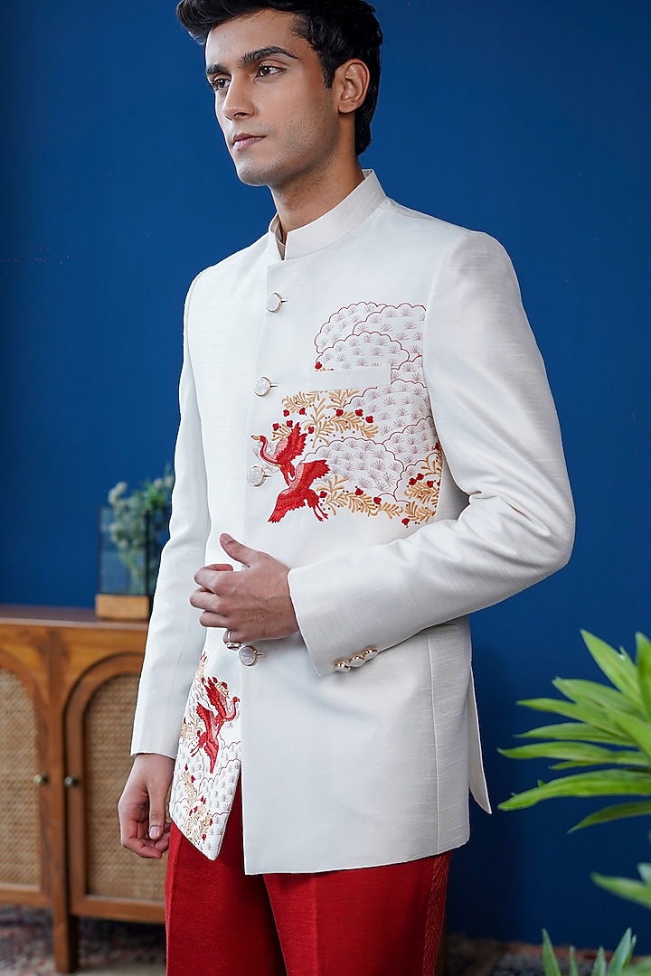Off-White Silk Blend Flora & Fauna Embroidered Bandhgala by Philocaly at Pernia's Pop Up Shop