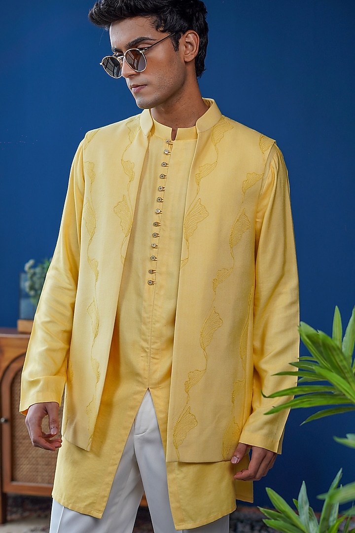 Yellow Cotton Silk Thread Embroidered Bundi Jacket by Philocaly