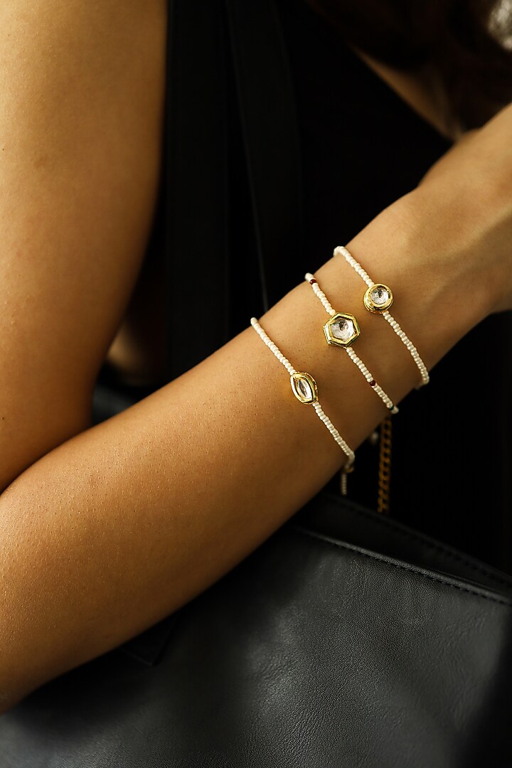 Gold Plated Kundan Polki & Pearl Bracelets (Set Of 3) by Do Taara at Pernia's Pop Up Shop