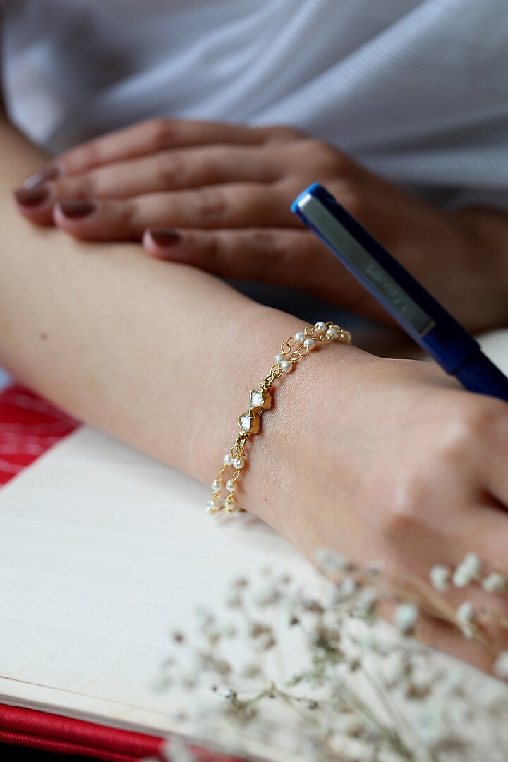 Gold Finish Kundan Polki & Pearl Adjustable Bracelet by Do Taara at Pernia's Pop Up Shop