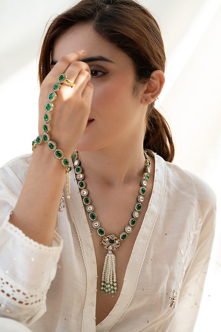Gold Plated Green Cubic Zirconia Hathphool by Do Taara at Pernia's Pop Up Shop