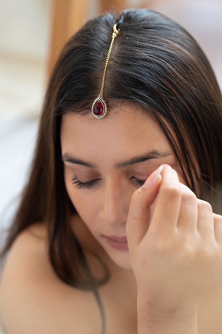 Gold Plated Red Stone & Cubic Zirconia Maangtikka by Do Taara at Pernia's Pop Up Shop