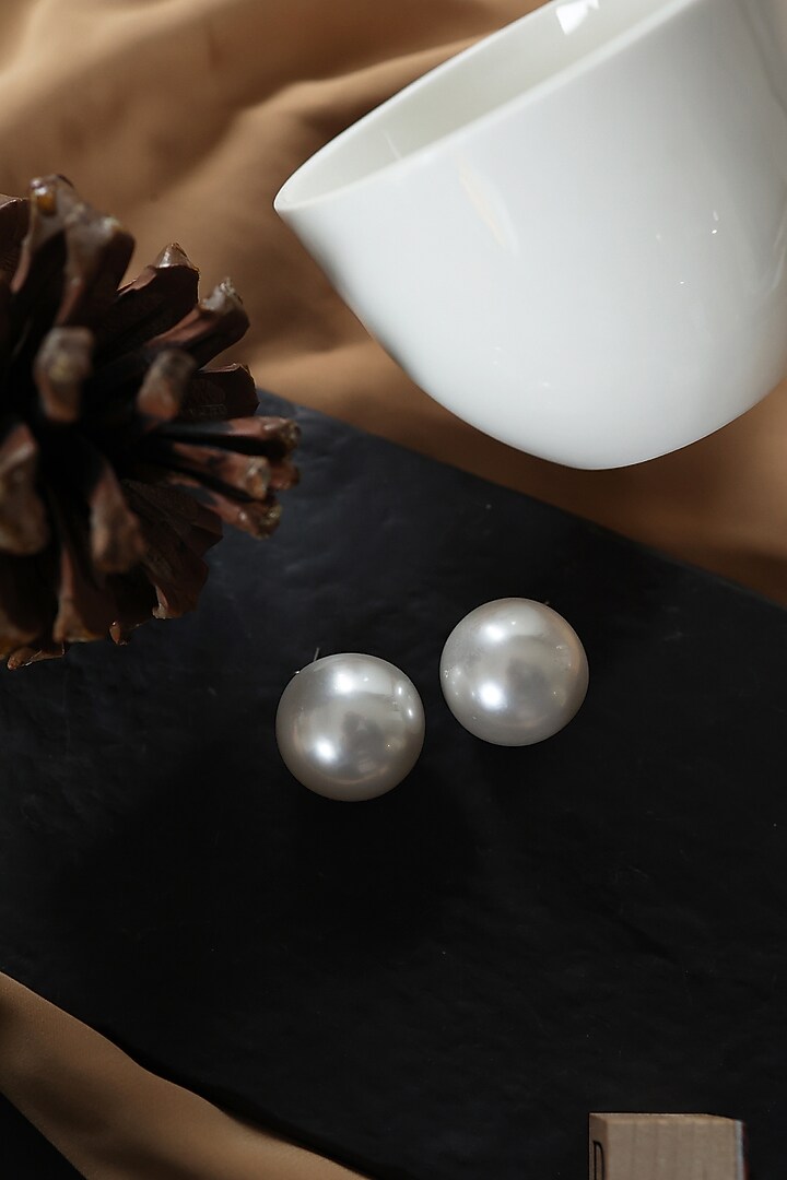 White Rhodium Finish Pearl Stud Earrings by Do Taara at Pernia's Pop Up Shop