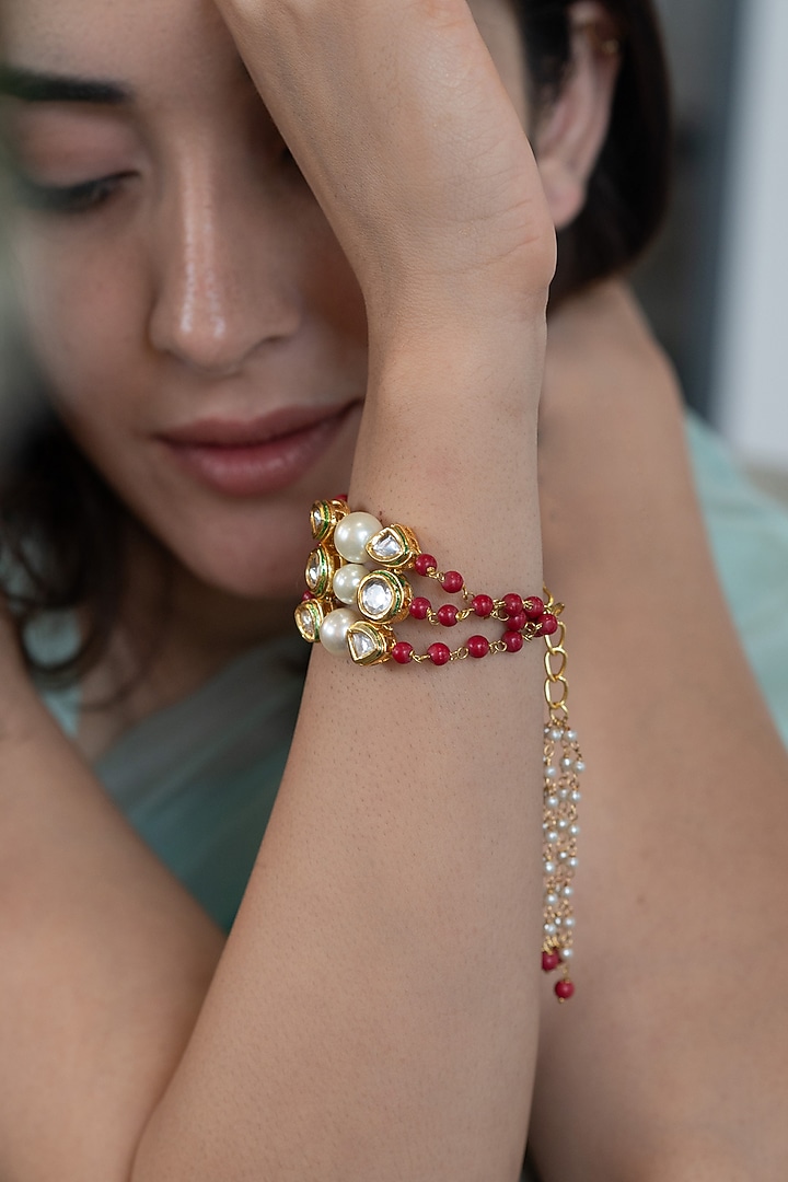 Gold Plated Orange Kundan Polki & Pearl Bracelet by Do Taara at Pernia's Pop Up Shop