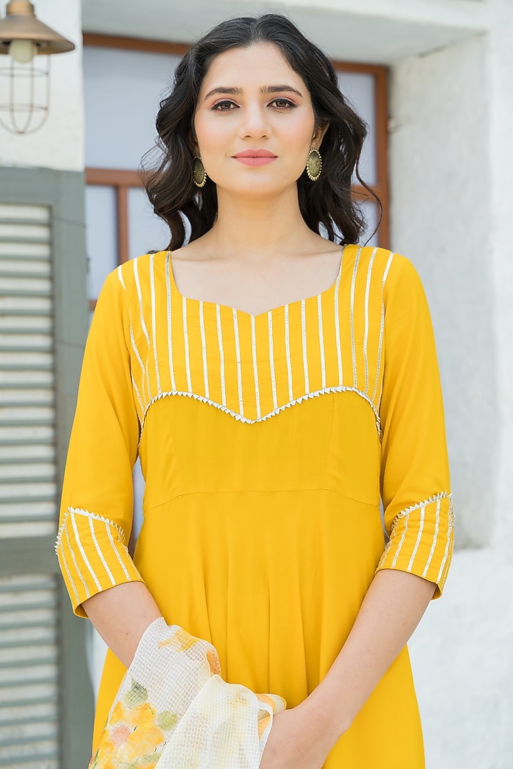 Yellow Embroidered Kurta Set by Pheeta at Pernia's Pop Up Shop