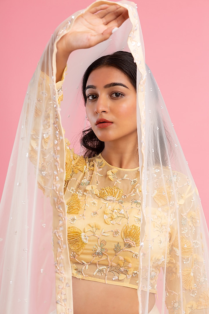 Ivory Asymmetrical Layered Wedding Lehenga Set by Piri India at Pernia's Pop Up Shop