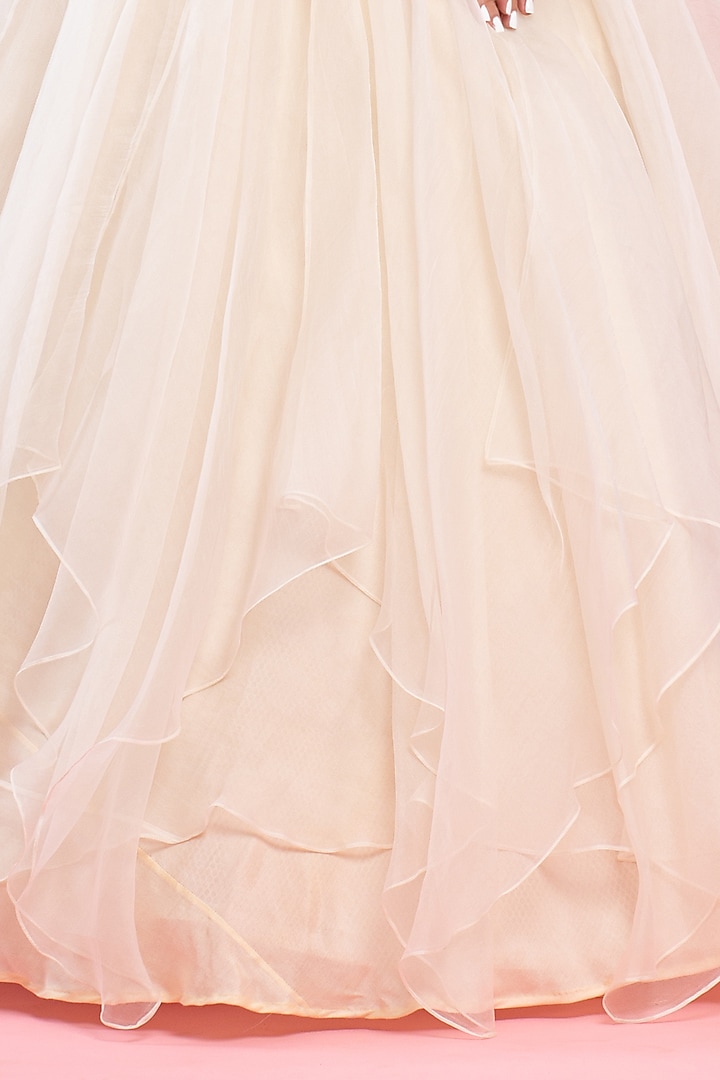 Ivory Asymmetrical Layered Wedding Lehenga Set by Piri India at Pernia's Pop Up Shop