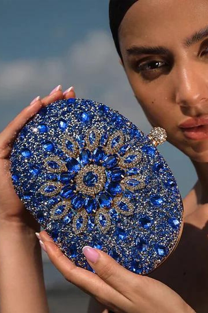 Blue Polyester Embellished Clutch by Pine & Drew at Pernia's Pop Up Shop