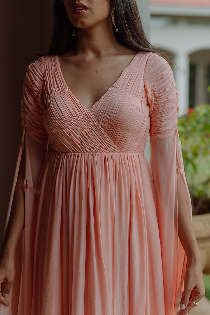 Peach Overlap Gown With Ruched Bodice by PINUP BY ASTHA at Pernia's Pop Up Shop