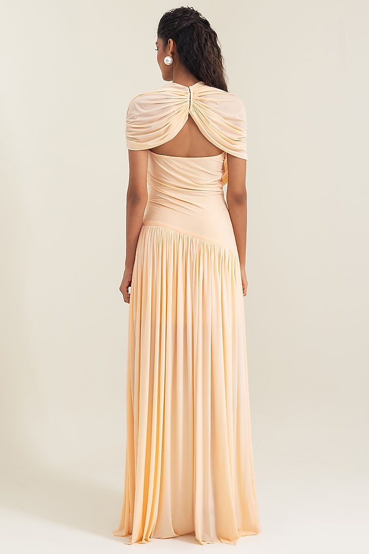 Peach Fuzz Malai Lycra Pleated Party Wear Gown by PINUP BY ASTHA at Pernia's Pop Up Shop 2026 Peach Fuzz Malai Lycra Pleated Party Wear Gown by PINUP BY ASTHA at Pernia's Pop Up Shop 2026