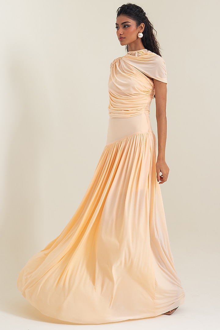 Peach Fuzz Malai Lycra Pleated Party Wear Gown by PINUP BY ASTHA at Pernia's Pop Up Shop