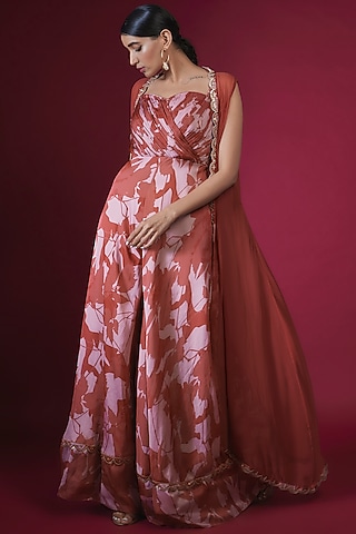 Maroon Satin Chiffon Leaf Printed Gathered Jumpsuit With Jacket by PITARA BY SIPIKA CHAWLA