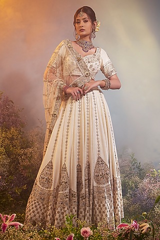 Ivory Raw Silk Zari Embroidered Lehenga Set by Peach It Up By Samridhi