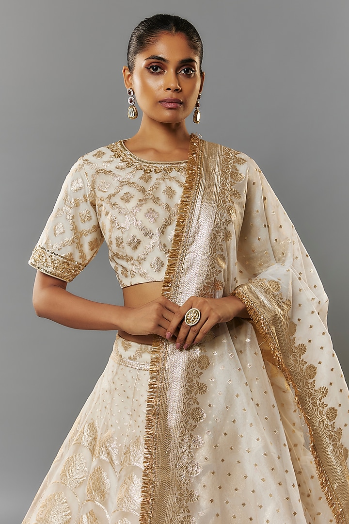 Ivory Banarasi Organza Hand Embroidered Wedding Lehenga Set by Priyanka Jha at Pernia's Pop Up Shop