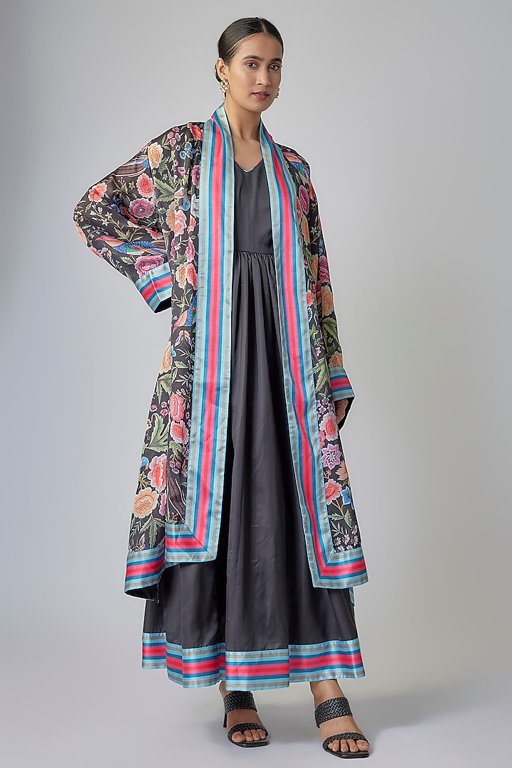 Black Modal Satin Parsi Gara Motif Maxi Dress With Cape by Priyanka Jha at Pernia's Pop Up Shop