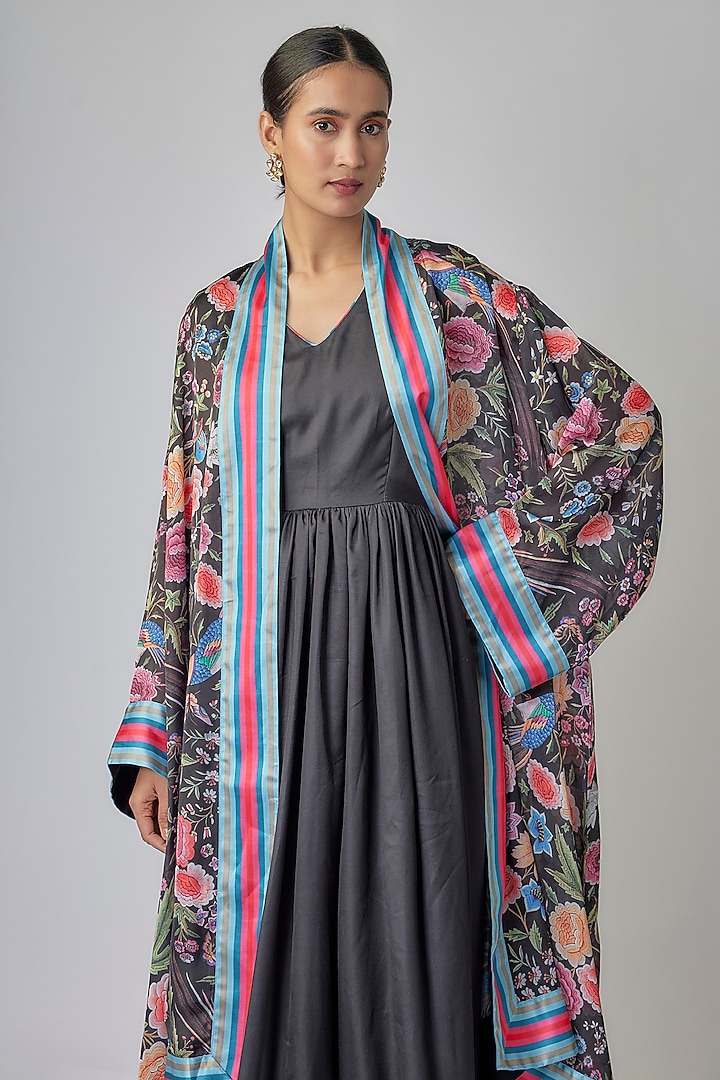 Black Modal Satin Parsi Gara Motif Maxi Vacation Dress With Cape by Priyanka Jha at Pernia's Pop Up Shop