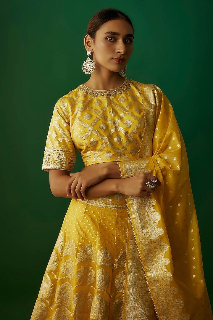 Turmeric Yellow Banarasi Organza Hand Embroidered Wedding Lehenga Set by Priyanka Jha at Pernia's Pop Up Shop