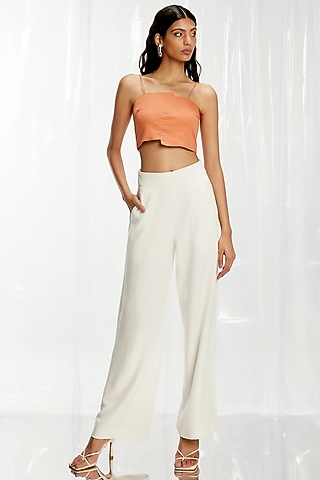 Powder White Crepe Pants by Pocketful Of Cherrie