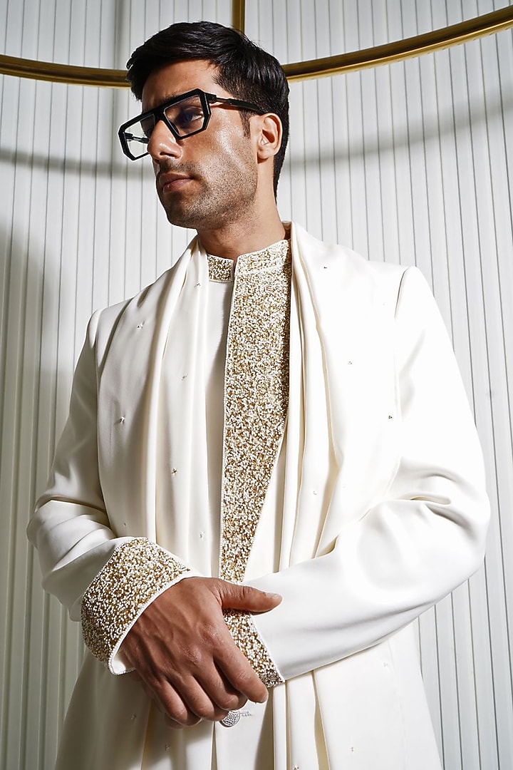Off-White Japanese Poly Beads & Cutdana Embellished Asymmetric Groom Indowestern Jacket Set by P.S PANKAJ SONI at Pernia's Pop Up Shop