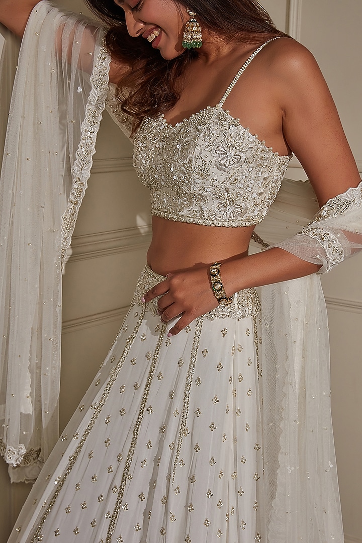 Ivory & Gold Georgette Sequins & Cutdana Embroidered Wedding Lehenga Set by Pritika Vora at Pernia's Pop Up Shop