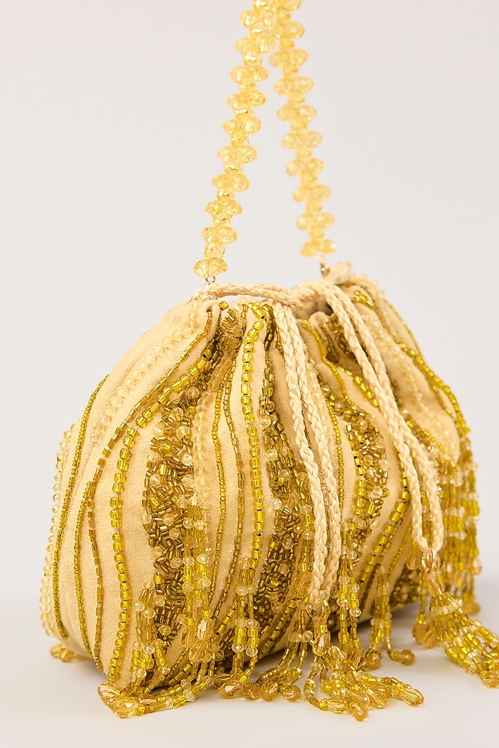 Lime Suede Hand Embellished Potli by PLODE at Pernia's Pop Up Shop