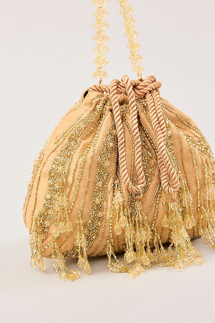 Gold Suede Hand Embellished Potli by PLODE at Pernia's Pop Up Shop