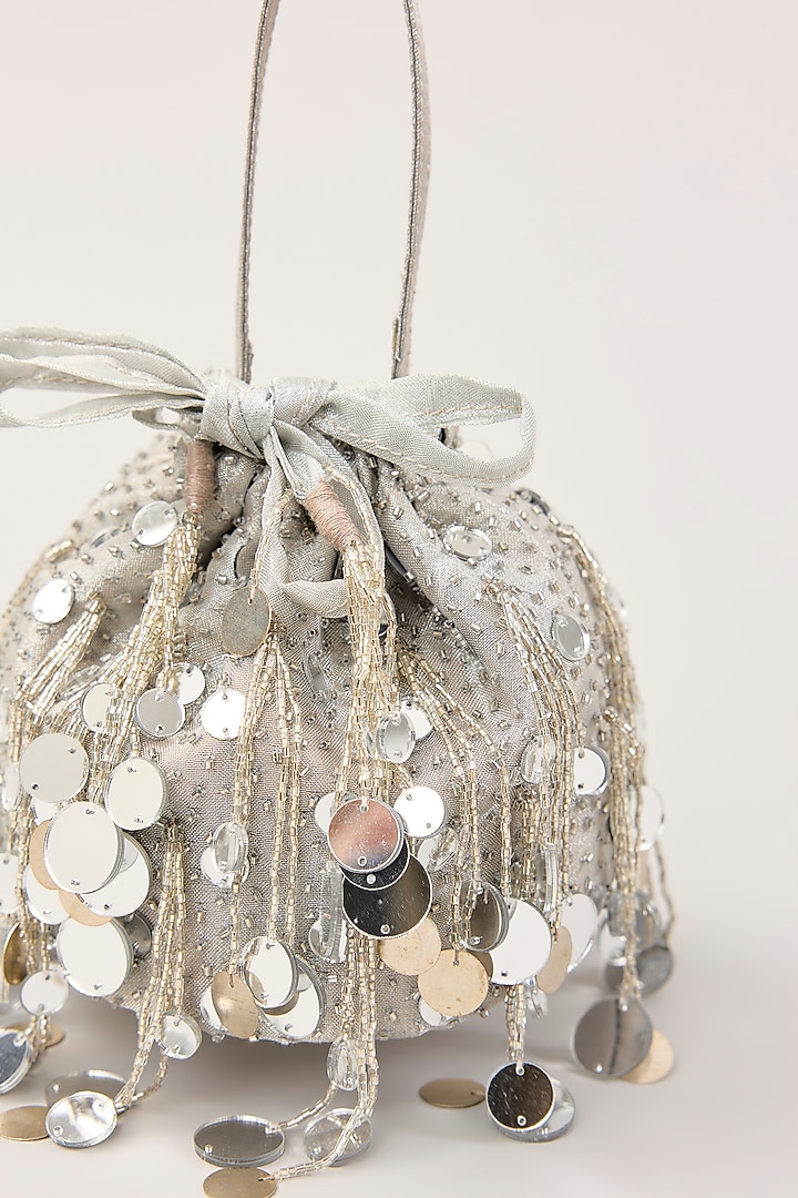Silver Tissue Mirror Hand Embellished Potli by PLODE at Pernia's Pop Up Shop