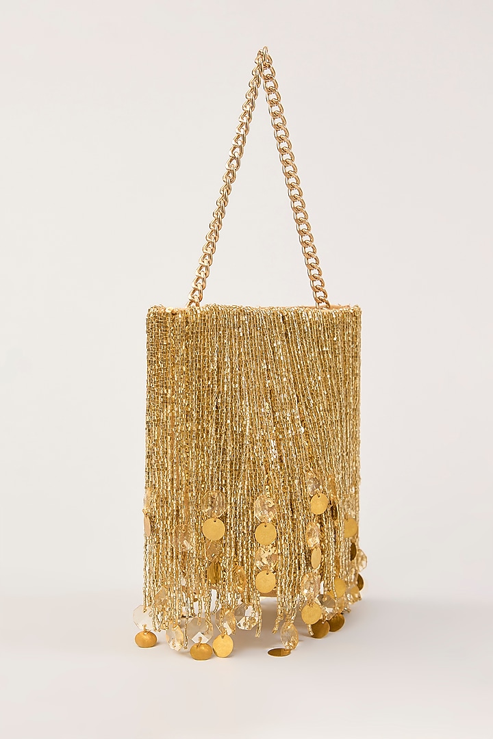 Gold Suede Tassel Hand Embellished Potli  by PLODE at Pernia's Pop Up Shop