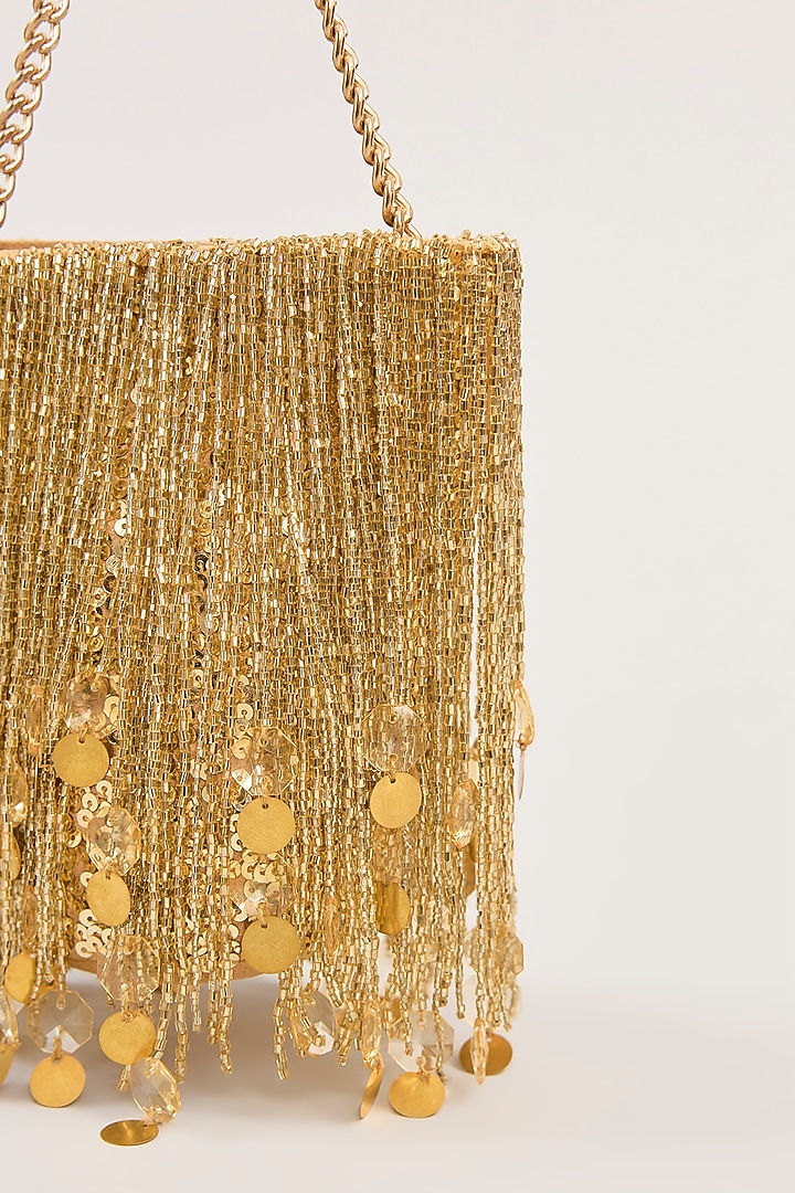 Gold Suede Tassel Hand Embellished Potli  by PLODE at Pernia's Pop Up Shop