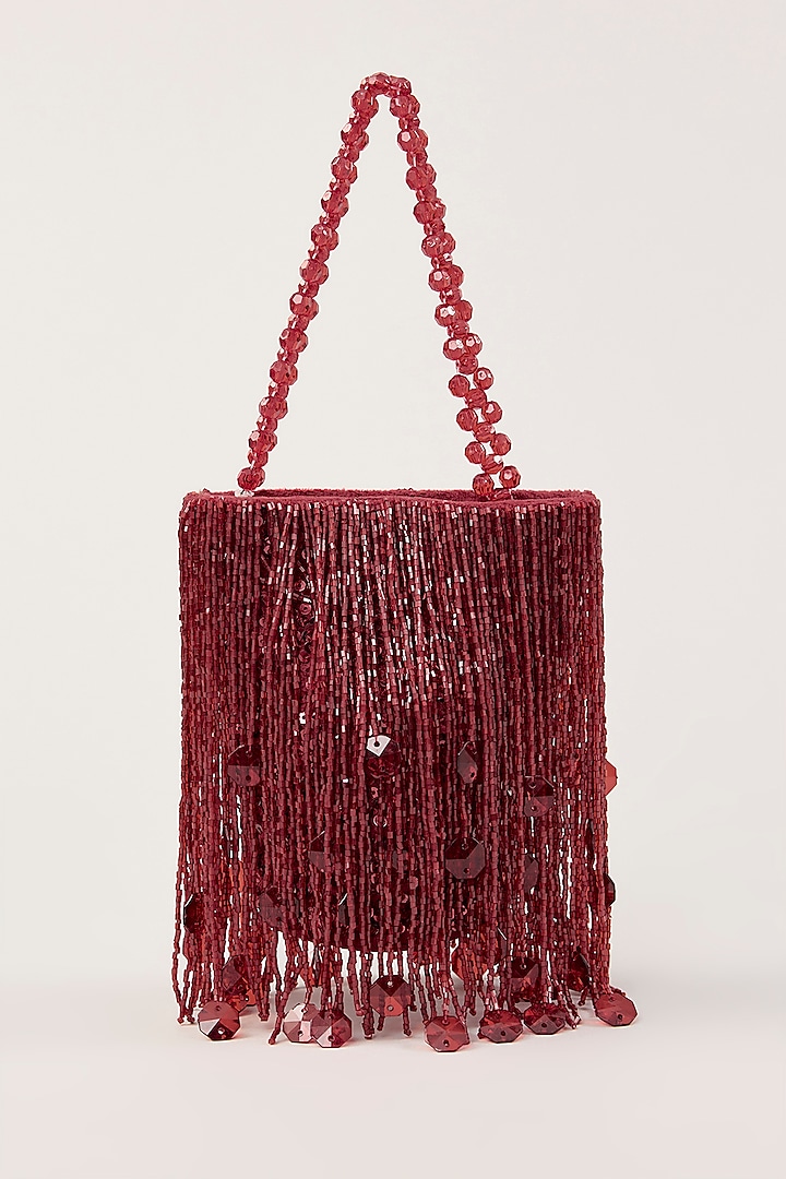 Red Suede Tassel Hand Embellished Potli by PLODE at Pernia's Pop Up Shop