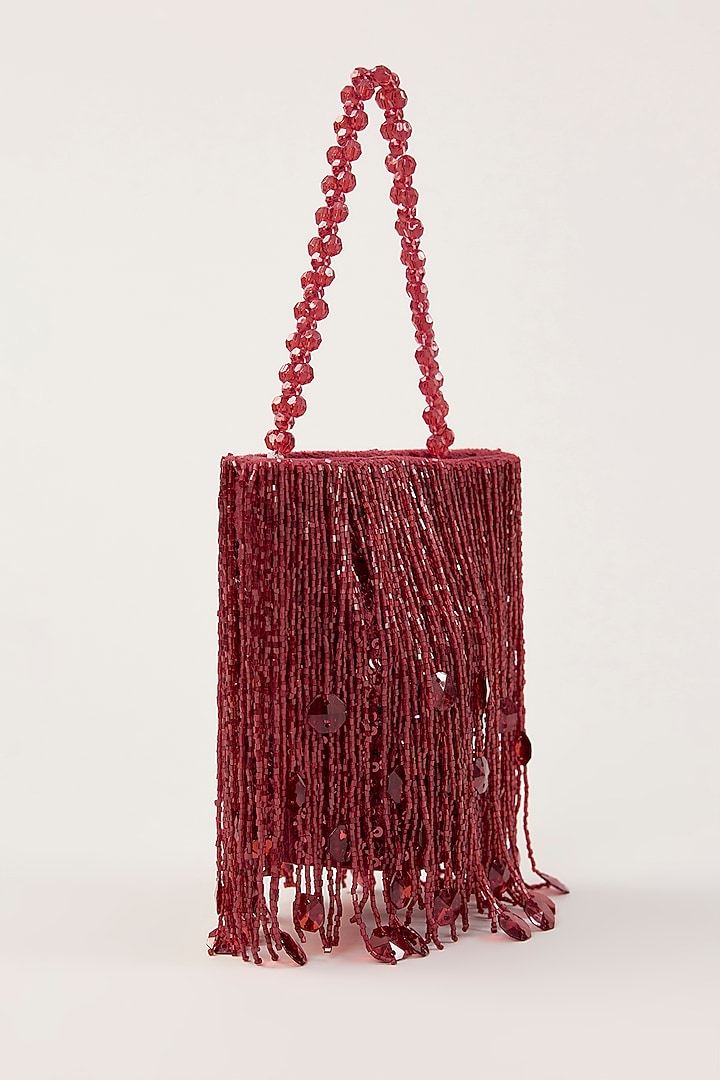 Red Suede Tassel Hand Embellished Potli by PLODE at Pernia's Pop Up Shop