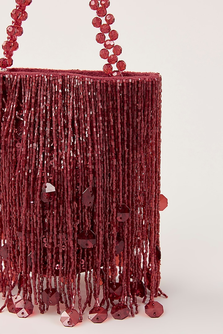 Red Suede Tassel Hand Embellished Potli by PLODE at Pernia's Pop Up Shop