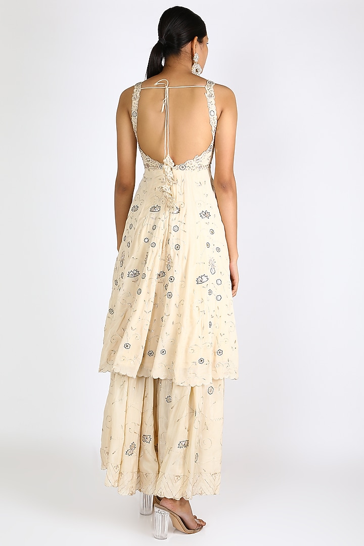 Ivory Embroidered Sharara Set by Pleats By Kaksha & Dimple at Pernia's Pop Up Shop