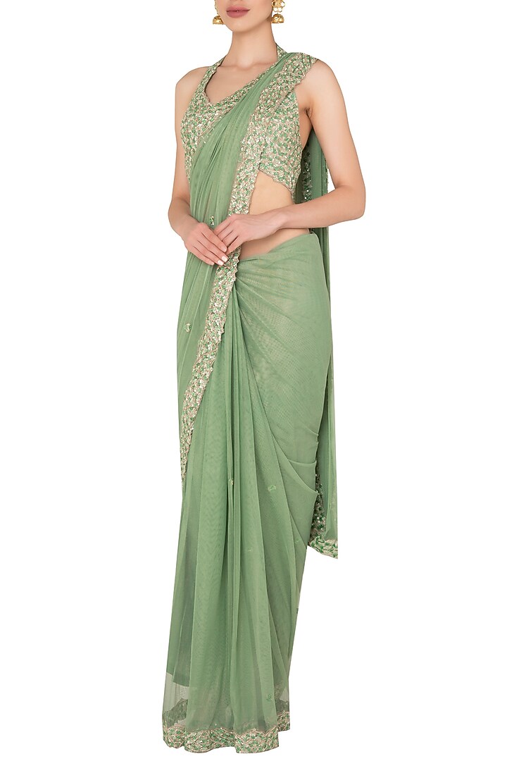 Seaglass green sequin sari set in raw slik and shimmer net available only at Pernia's Pop Up Shop.