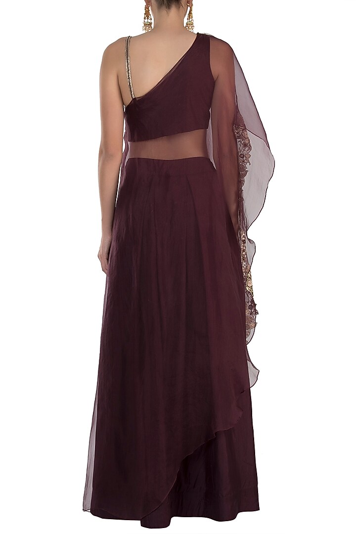 Wine embroidered cape with crop top and skirt by Pleats by Kaksha & Dimple at Pernia's Pop Up Shop