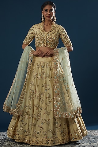 Cream Raw Silk Embroidered Lehenga Set by Peppermint Diva