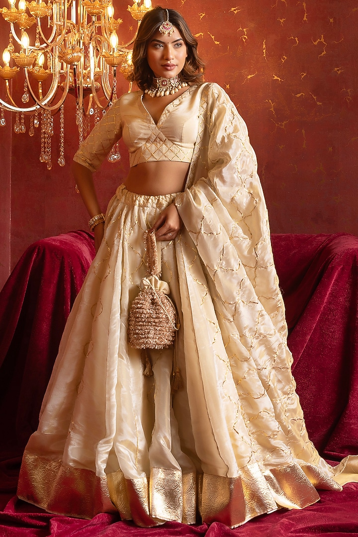 Ivory Cosmo Silk Gota Patti Work Wedding Lehenga Set by Pomcha Jaipur at Pernia's Pop Up Shop