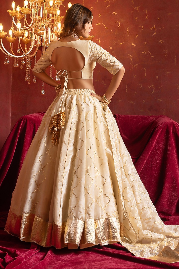 Ivory Cosmo Silk Gota Patti Work Wedding Lehenga Set by Pomcha Jaipur at Pernia's Pop Up Shop