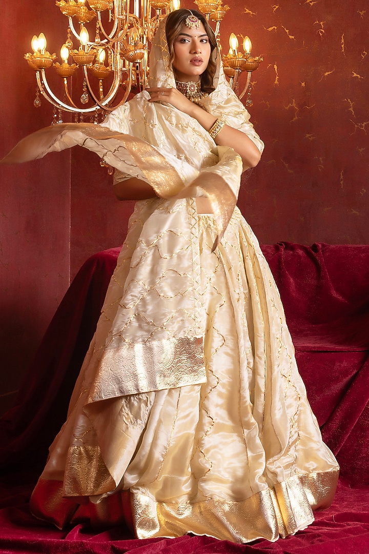 Ivory Cosmo Silk Gota Patti Work Wedding Lehenga Set by Pomcha Jaipur at Pernia's Pop Up Shop
