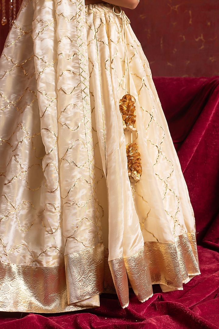 Ivory Cosmo Silk Gota Patti Work Wedding Lehenga Set by Pomcha Jaipur at Pernia's Pop Up Shop