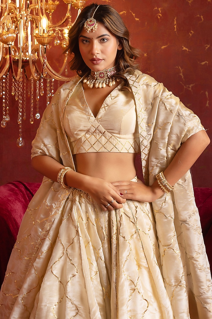 Ivory Cosmo Silk Gota Patti Work Wedding Lehenga Set by Pomcha Jaipur at Pernia's Pop Up Shop