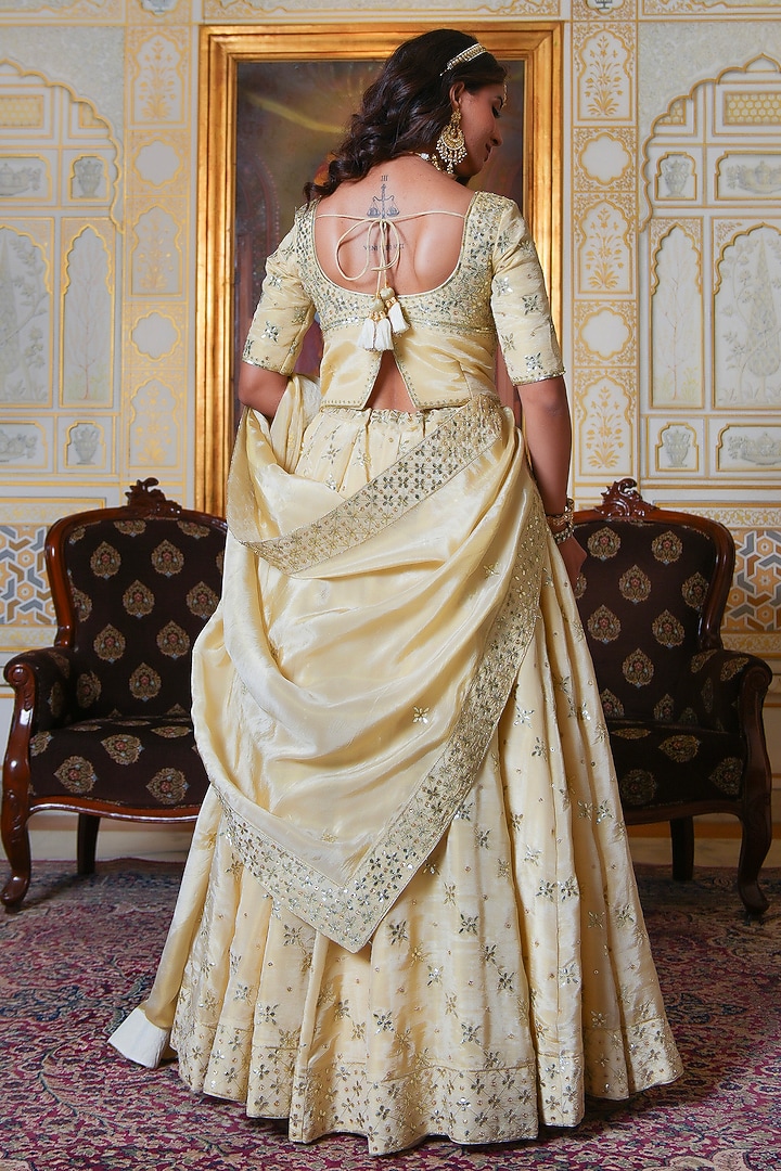 Gold Cosmos Silk Gota Patti Hand Embroidered Wedding Lehenga Set by Pomcha Jaipur at Pernia's Pop Up Shop