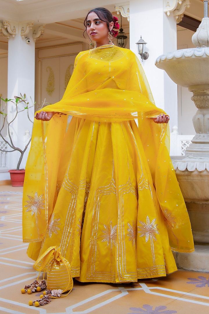 Yellow Organza Gota Patti Hand Embroidered Wedding Lehenga Set by Pomcha Jaipur at Pernia's Pop Up Shop