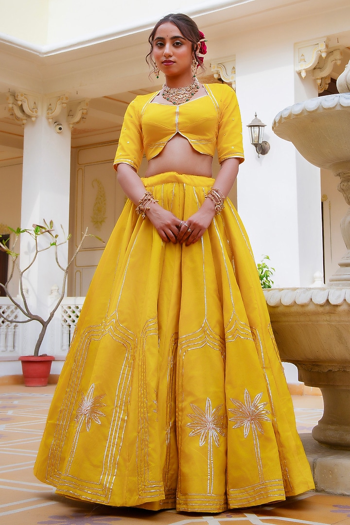 Yellow Organza Gota Patti Hand Embroidered Wedding Lehenga Set by Pomcha Jaipur at Pernia's Pop Up Shop
