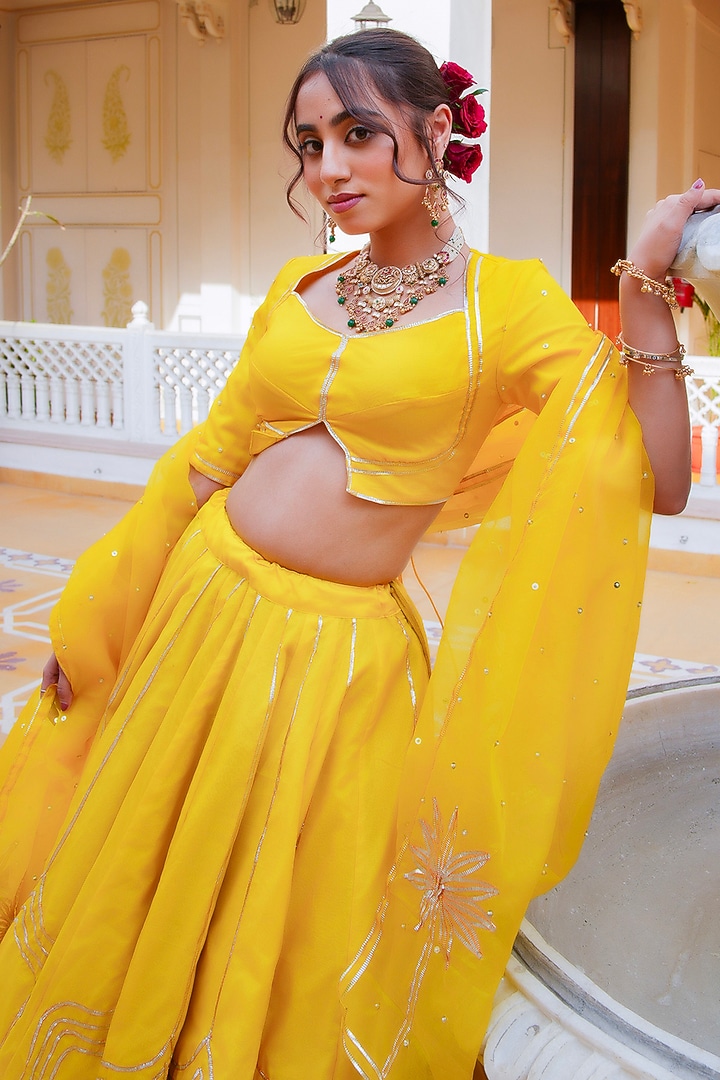 Yellow Organza Gota Patti Hand Embroidered Wedding Lehenga Set by Pomcha Jaipur at Pernia's Pop Up Shop