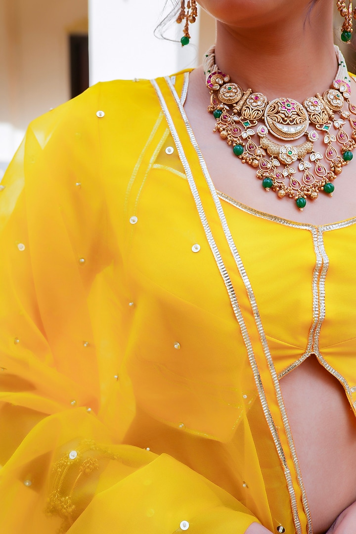 Yellow Organza Gota Patti Hand Embroidered Wedding Lehenga Set by Pomcha Jaipur at Pernia's Pop Up Shop