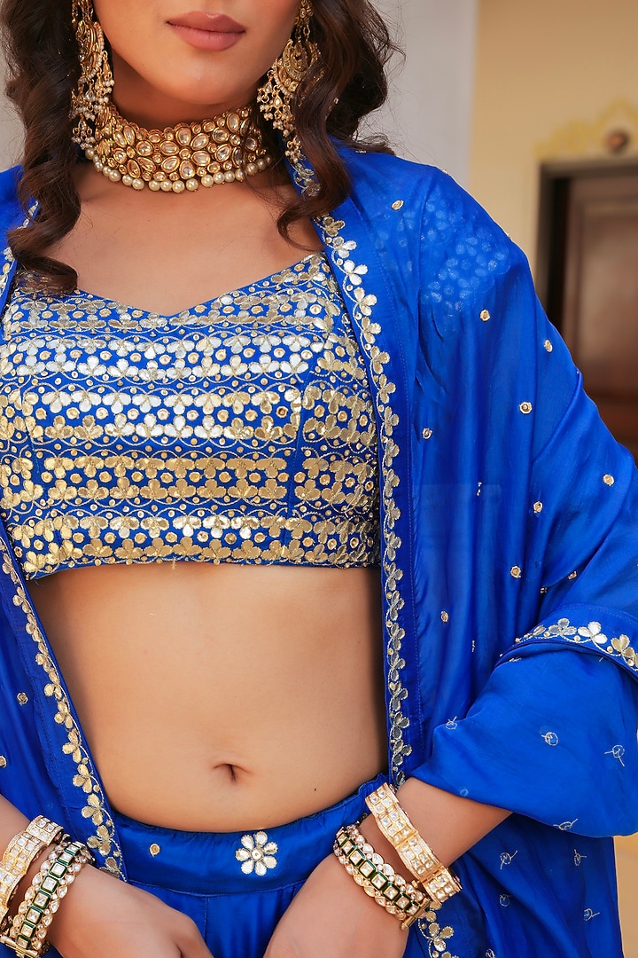 Blue Silk Gota Patti Hand Embroidered Wedding Lehenga Set by Pomcha Jaipur at Pernia's Pop Up Shop