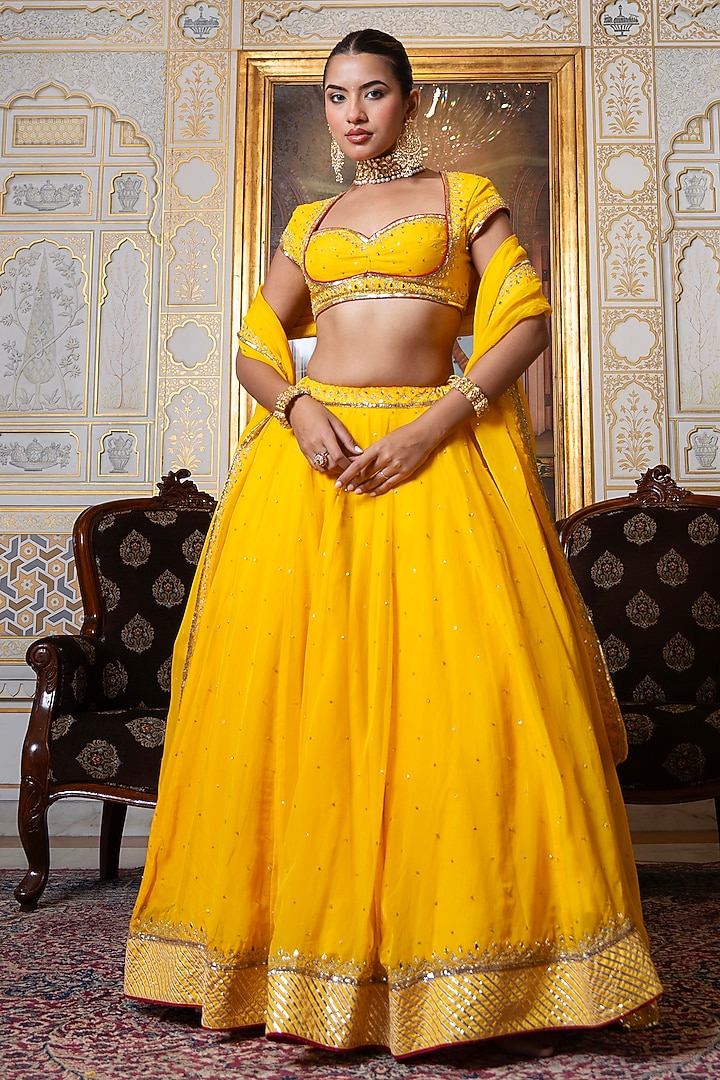 Marigold Yellow Organza Zari Hand Embroidered Wedding Lehenga Set by Pomcha Jaipur at Pernia's Pop Up Shop