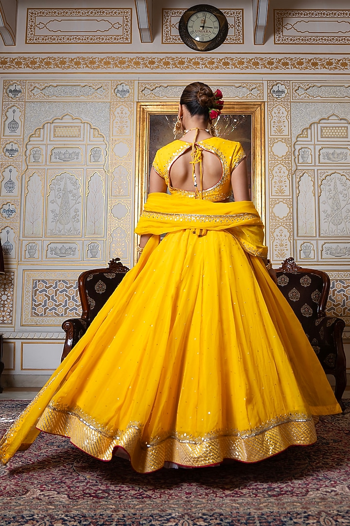 Marigold Yellow Organza Zari Hand Embroidered Wedding Lehenga Set by Pomcha Jaipur at Pernia's Pop Up Shop