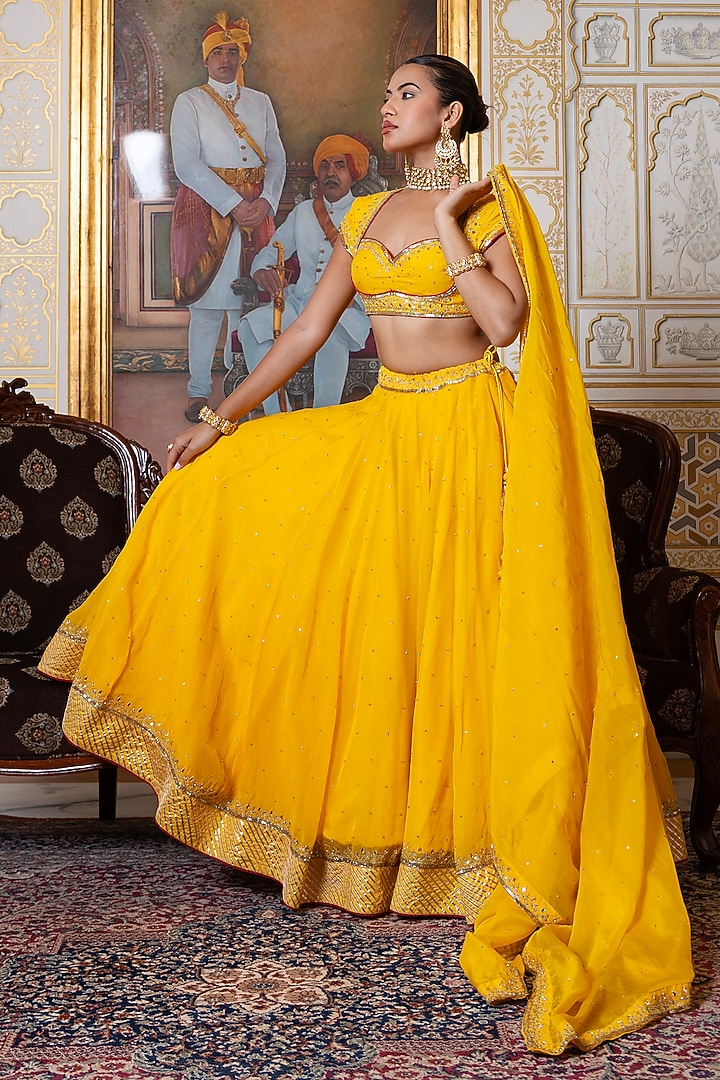Marigold Yellow Organza Zari Hand Embroidered Wedding Lehenga Set by Pomcha Jaipur at Pernia's Pop Up Shop